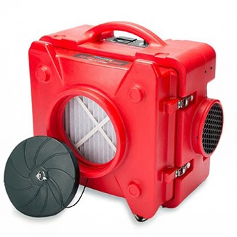 Red portable air scrubber with a large front grille and a filter,